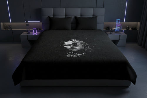Black duvet cover with a face design and text on a white background