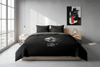 Black duvet cover with digital art design and text on a white background