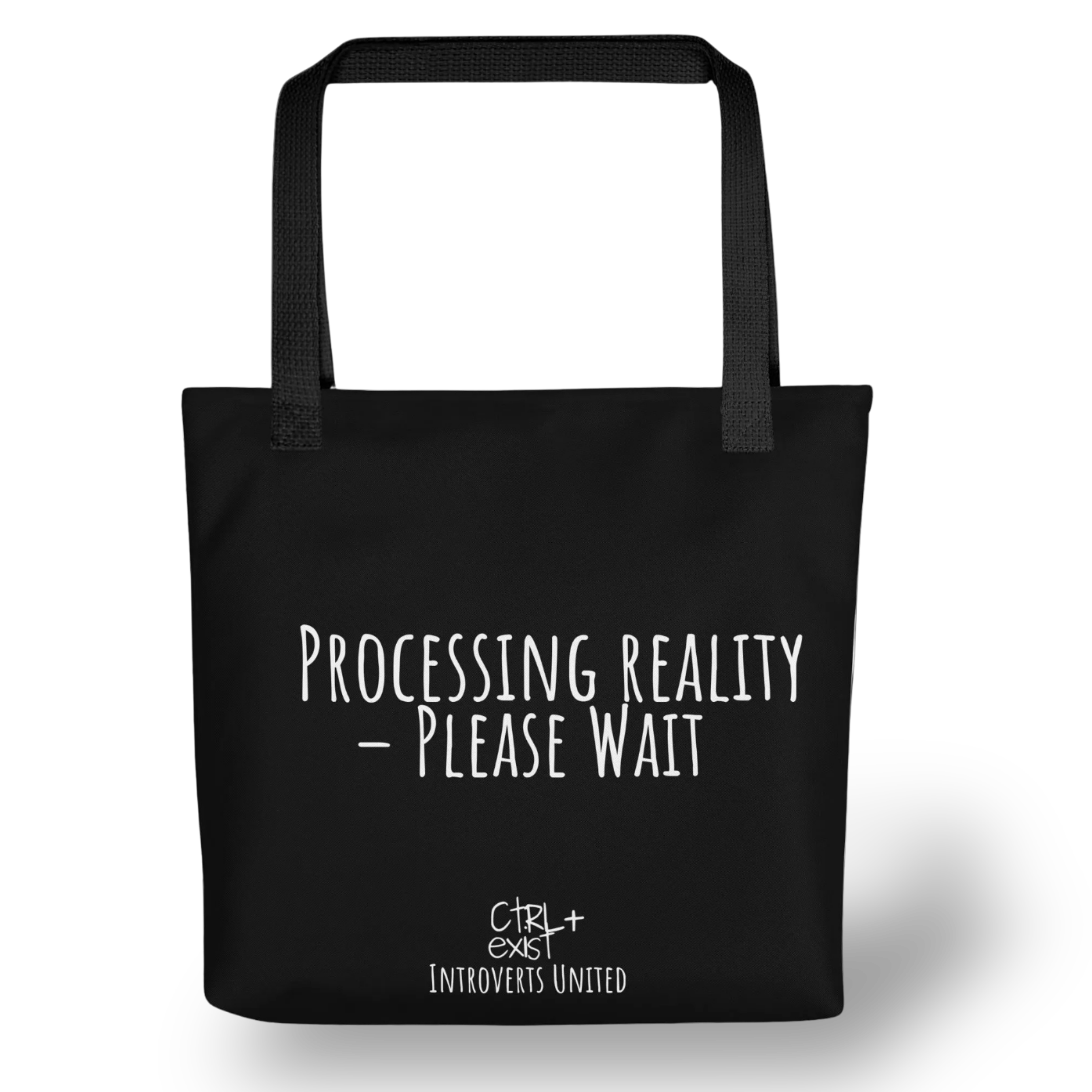 Black tote bag with white text 'Processing Reality - Please Wait' on a BLACK background