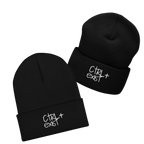 Two black beanies with 'Ctrl + Exist' white logo engraved on the front