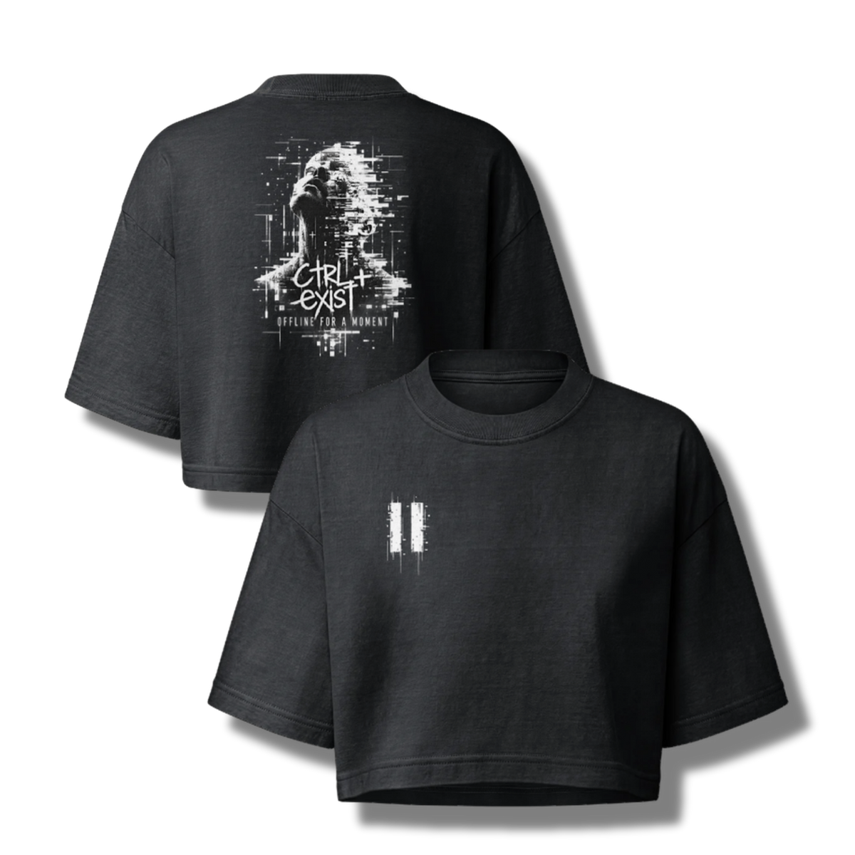 A black cropped t-shirt shown from both front and back. The front features a small white glitch-style graphic on the left chest, while the back displays a larger white glitch-art graphic of a face with the text 'GIRL I EXIST' and 'I'M NOT A HUMAN'.