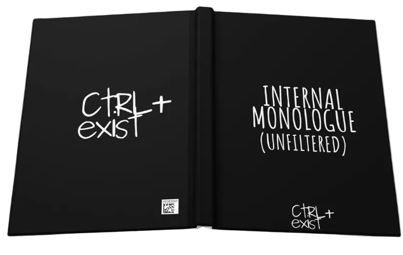 Open book with text 'CTRL+EXIST' and 'INTERNAL MONOLOGUE (UNFILTERED)' on black cover 