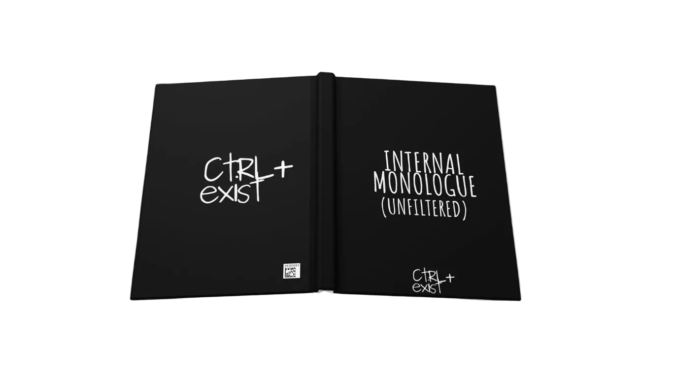 Open book with text 'CTRL+EXIST' and 'INTERNAL MONOLOGUE (UNFILTERED)' on black cover.