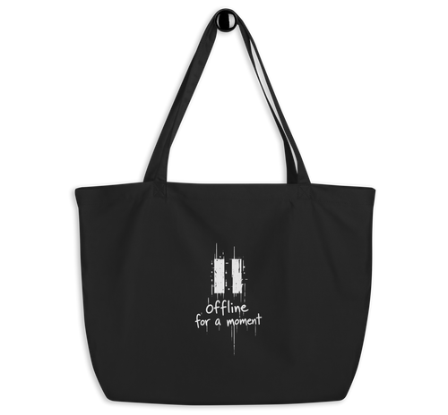 Black organic cotton tote bag with a white “Offline for a moment” graphic,